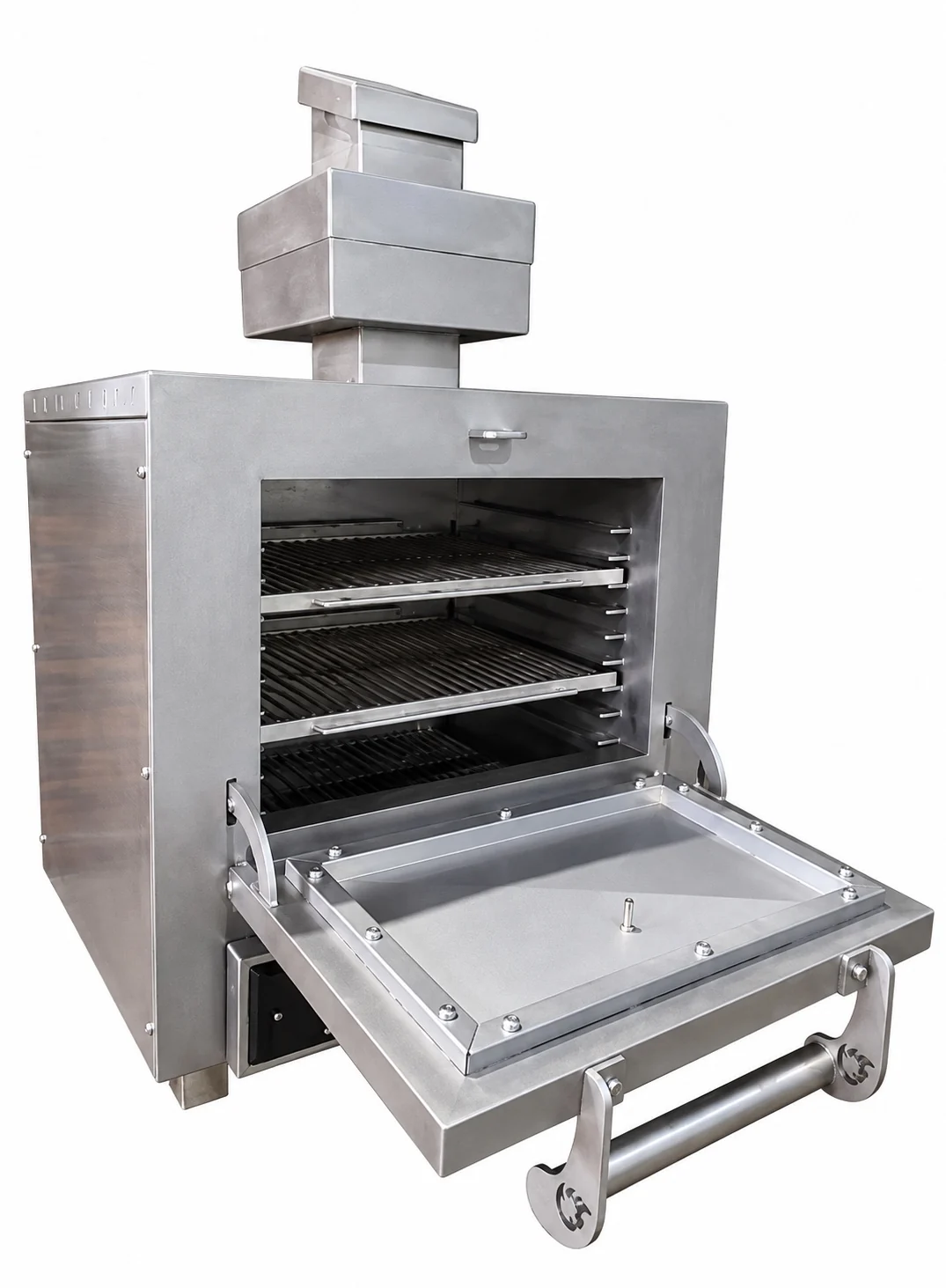 The Inferno 700 at an angle with its door folded down, showing three rod grids on runners in the stainless chamber, a black drawer below and the stepped firebreak and diffuser chimney on top.